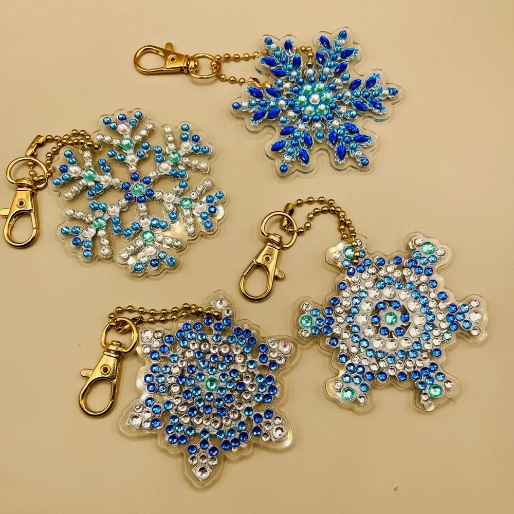 4 Christmas rhinestone snowflake ornaments. Handmade. Decorated on both sides.